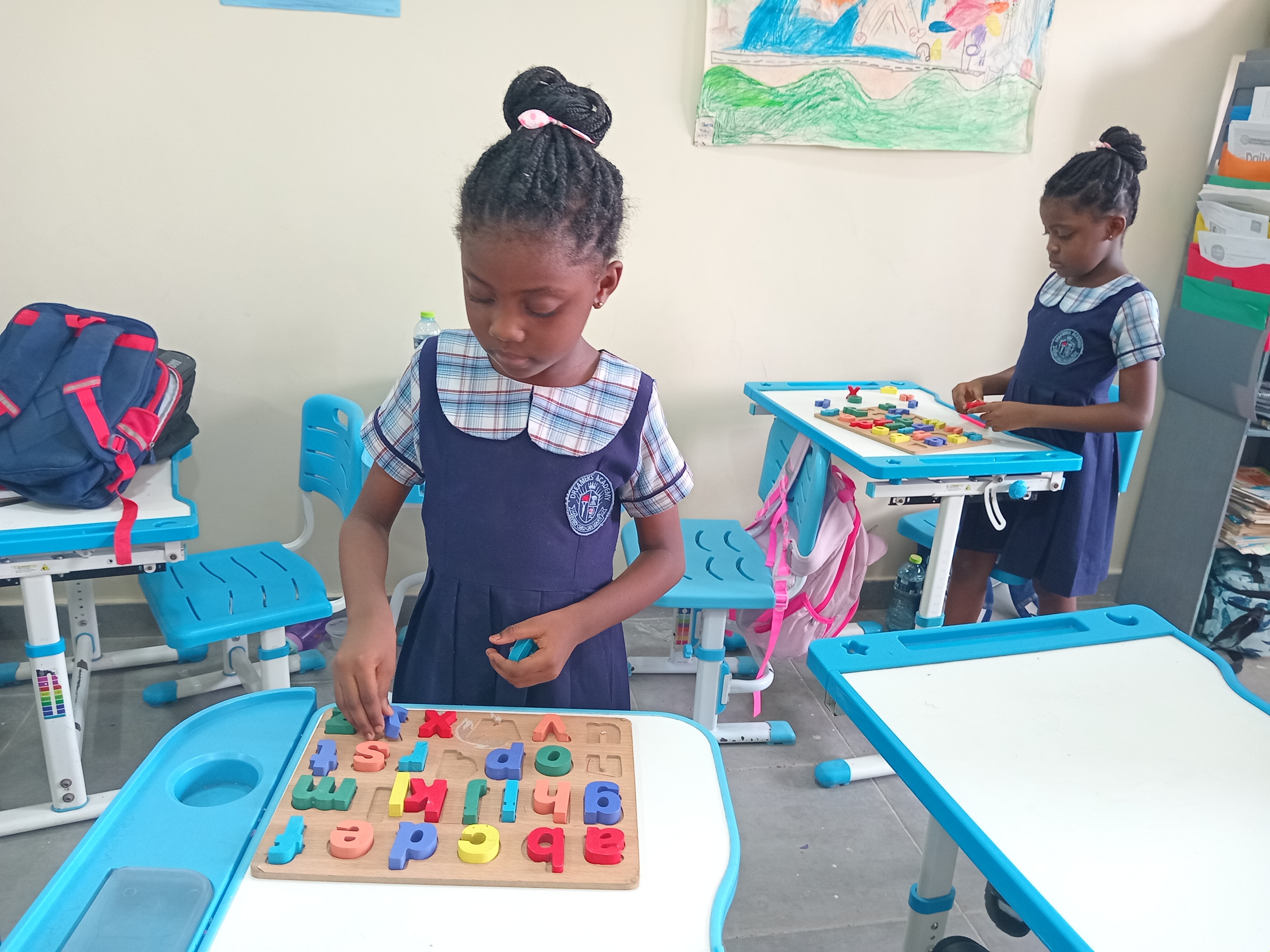 Teacher working one-on-one with a student